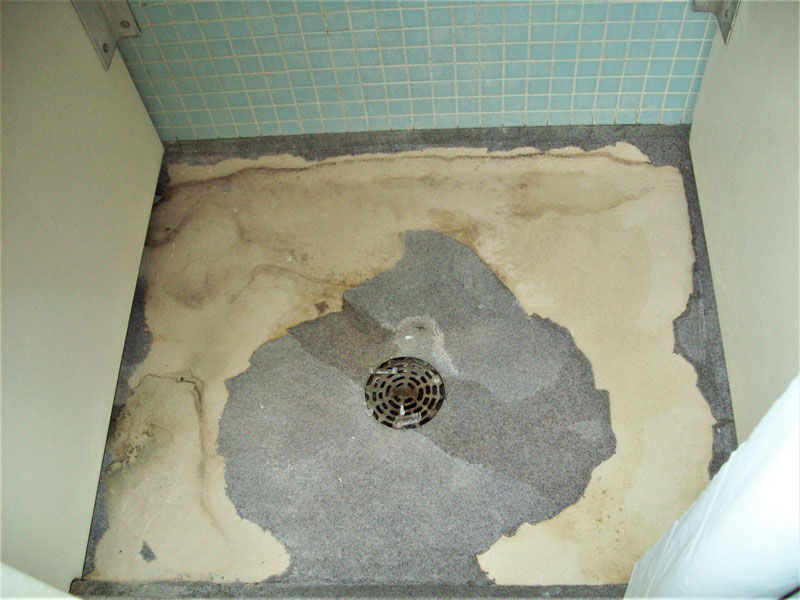 Existing coating has degraded with sharp edges, making the shower unsafe.